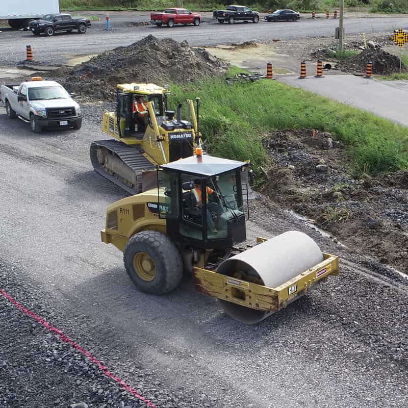 Closeup of a roller and bulldozer